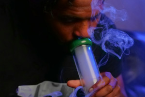 man using bong - featured image